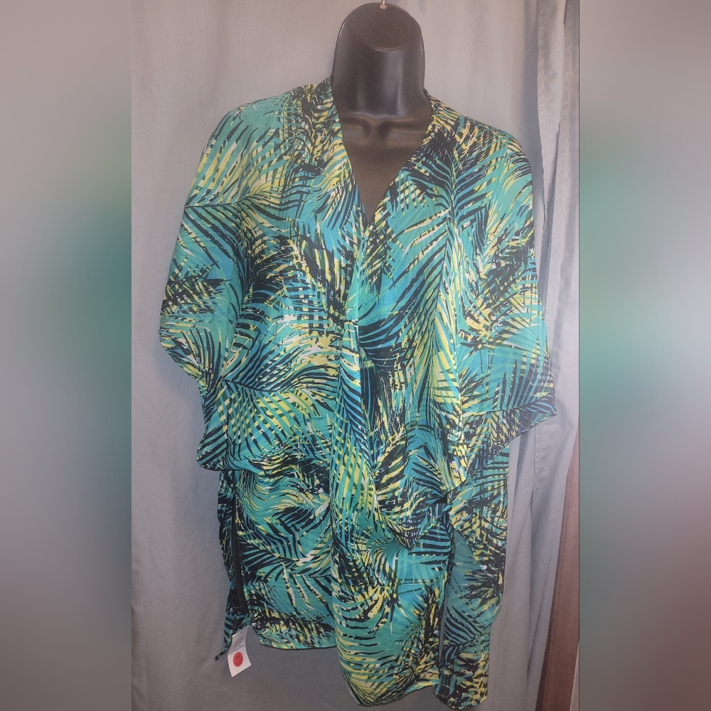 Vibrant one-size swimsuit cover-up in green, blue, and yellow.